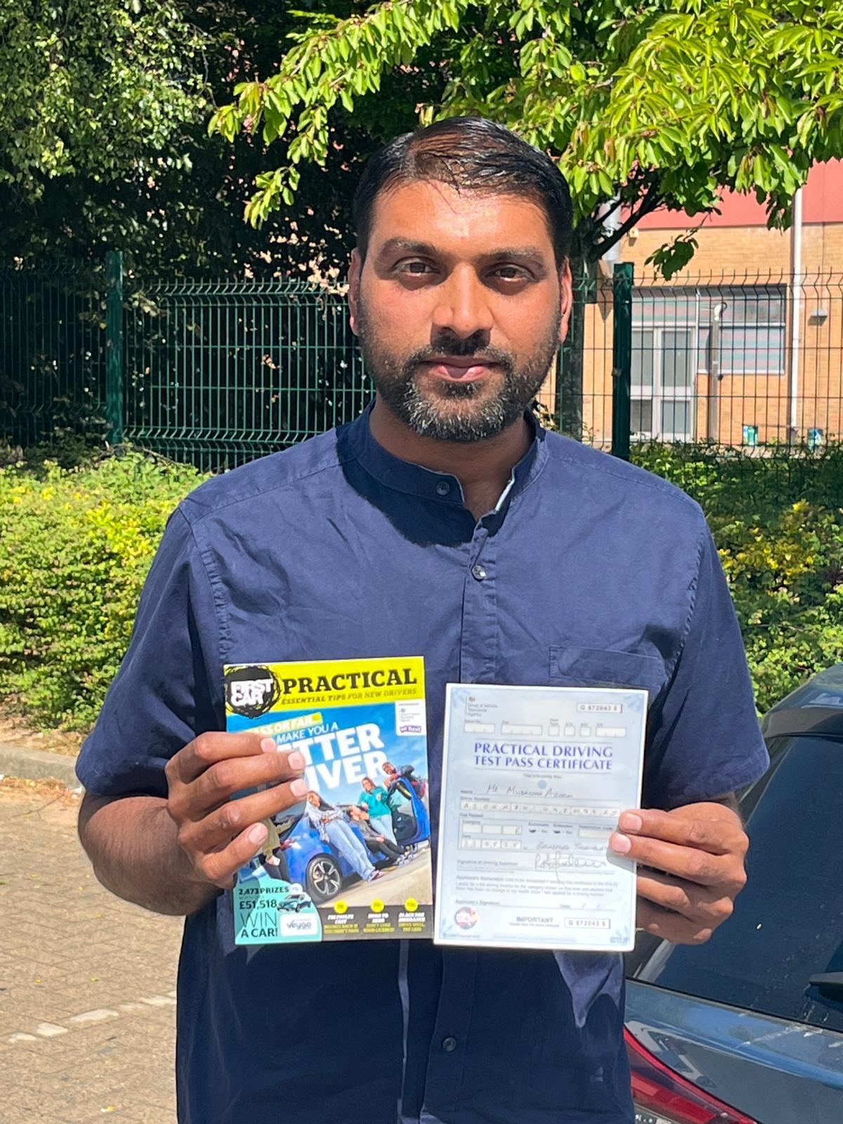 Student celebrating passing their driving test