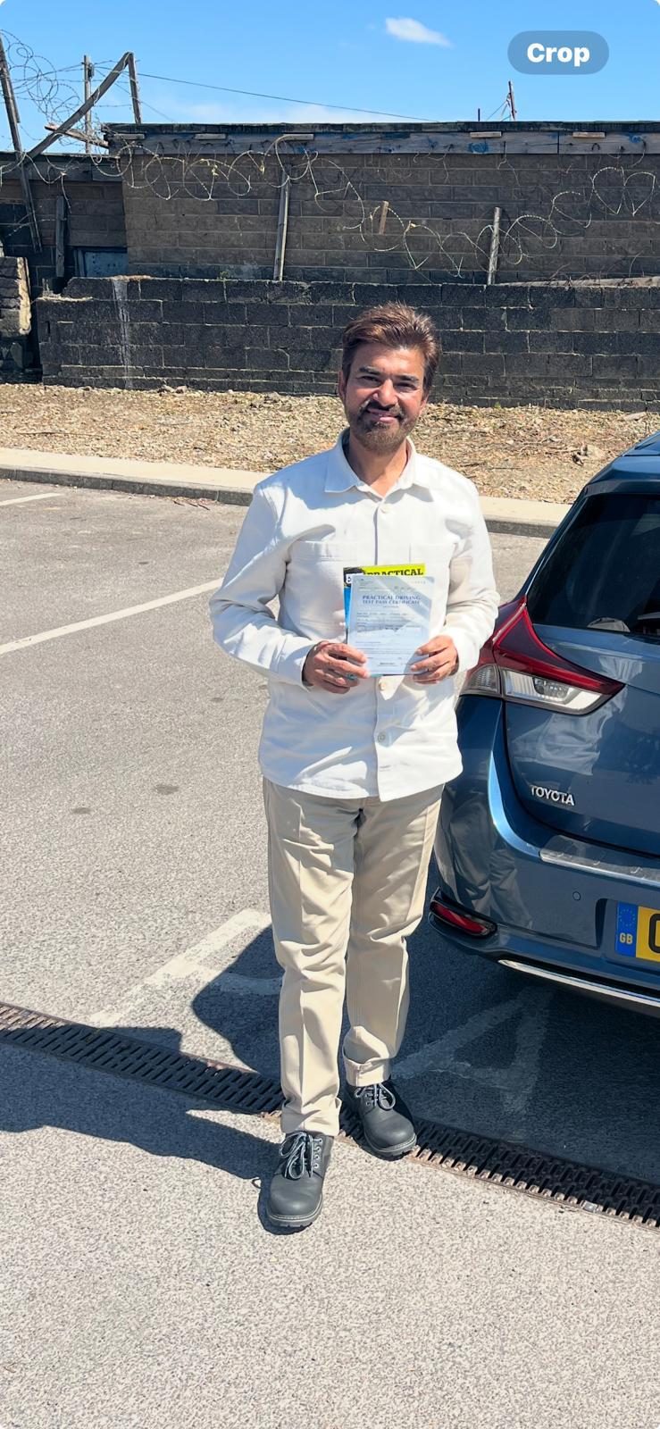 Student celebrating passing their driving test