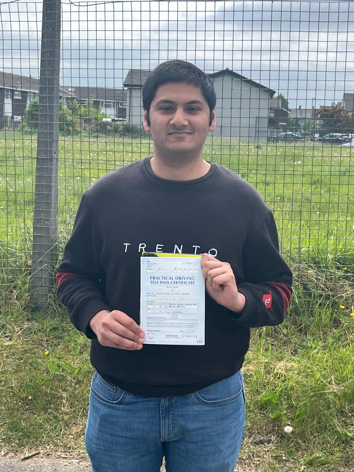 Student celebrating passing their driving test