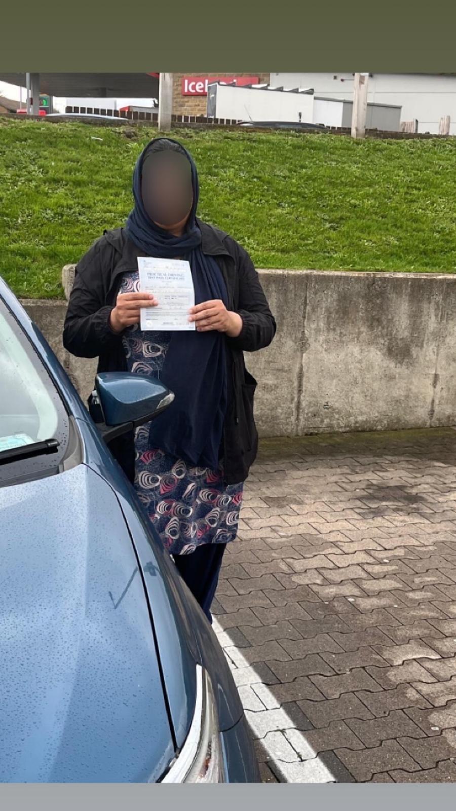 Student celebrating passing their driving test