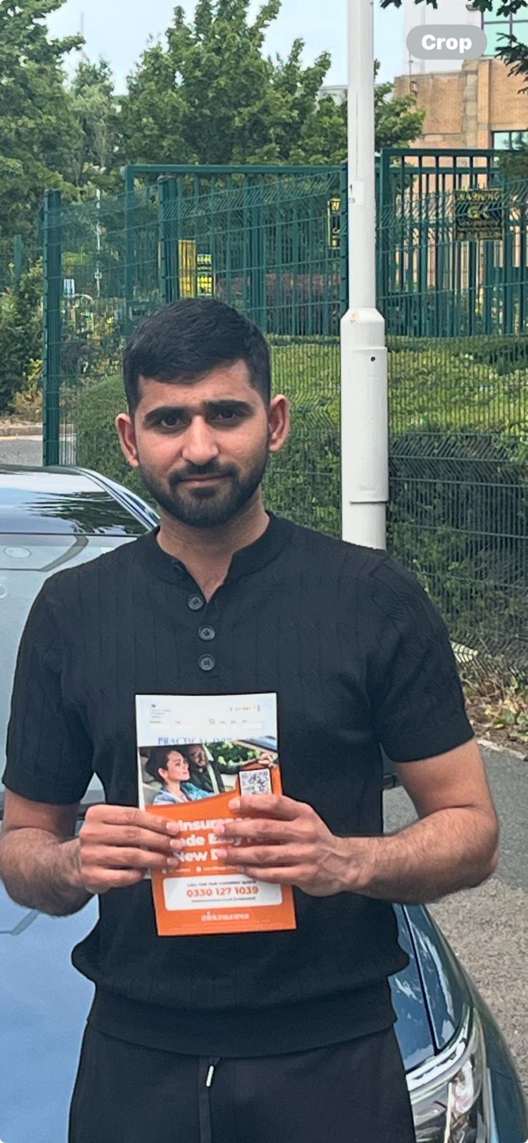 Student celebrating passing their driving test