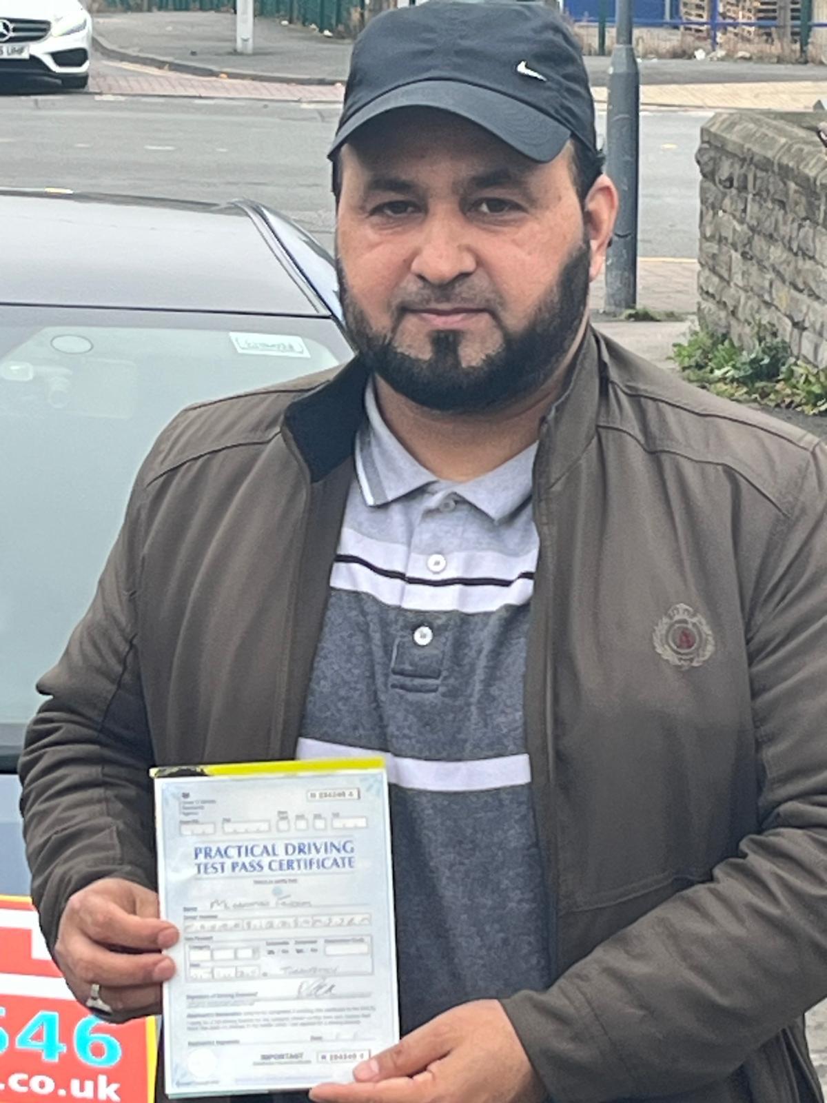 Student celebrating passing their driving test