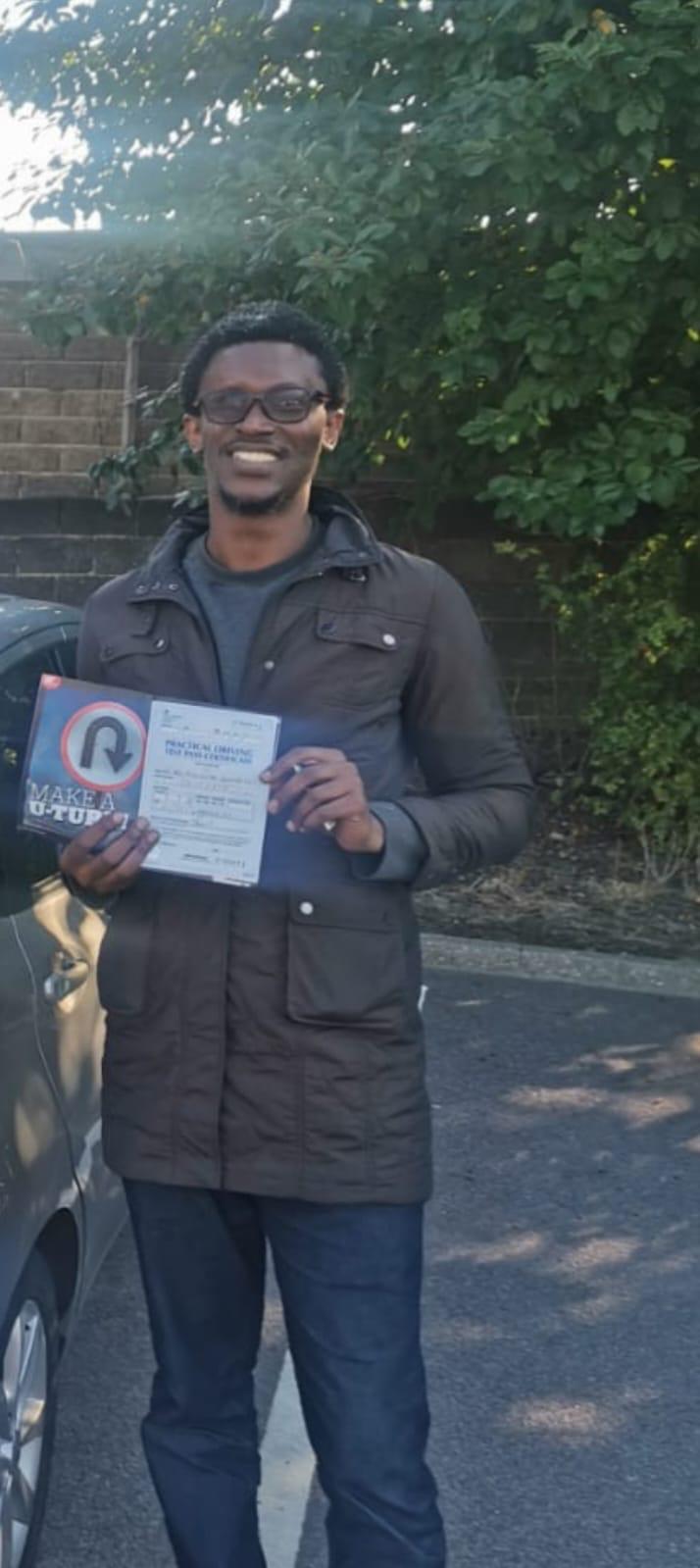 Student celebrating passing their driving test