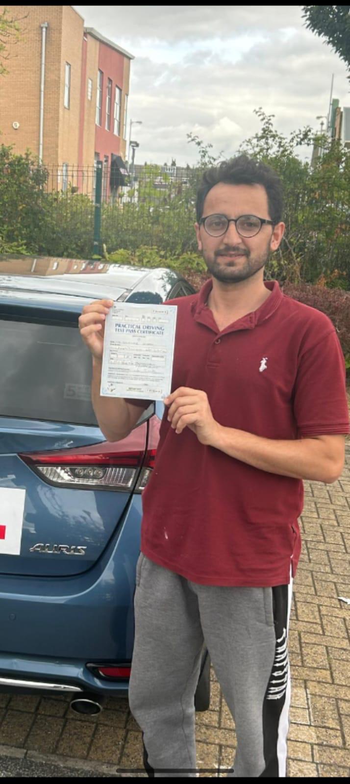 Student celebrating passing their driving test